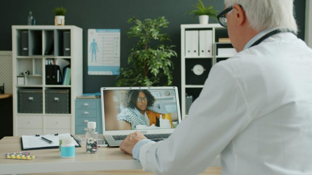 Doctor conducting a virtual consultation to issue an online medical certificate