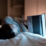 How does sleeping in total darkness improve your sleep?